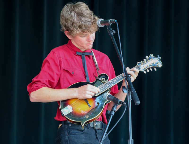 Blane Young with The Brothers Young at the 2026 Camp Springs Labor Blue Grass Festival - photo © Laura Tate Photography