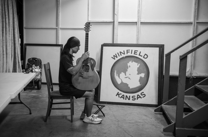 Goh Kurosawa waits for his turn during the Internation Finger Pick Guitar competition, 54th Annual Walnut Valley Festival, Wednesday, September 17th, 2026. Winfield, Kansas. Photo by Jeromie Stephens © 2026