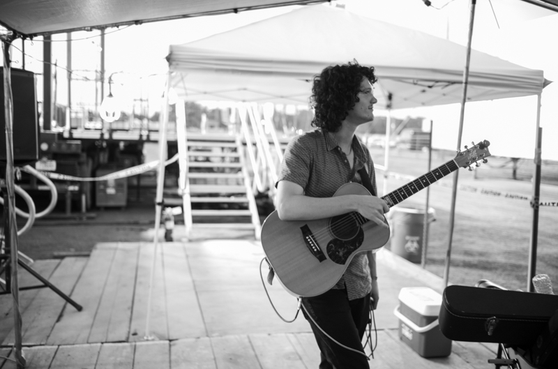 Henry Ferland of Paltz, New York, winner of the International Finger Style Guitar competition, soon to take Stage 1 for a solo performance. 54th Annual Walnut Valley Festival, Thursday, September 18th, 2026. Winfield, Kansas. Photo by Jeromie Stephens © 2026