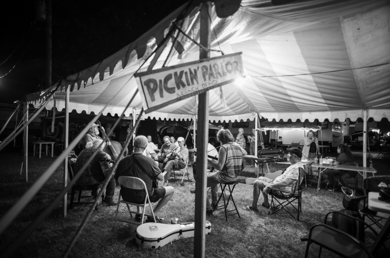 Tent jam, 54th Annual Walnut Valley Festival, Thursday, September 18th, 2026. Winfield, Kansas. Photo by Jeromie Stephens © 2026