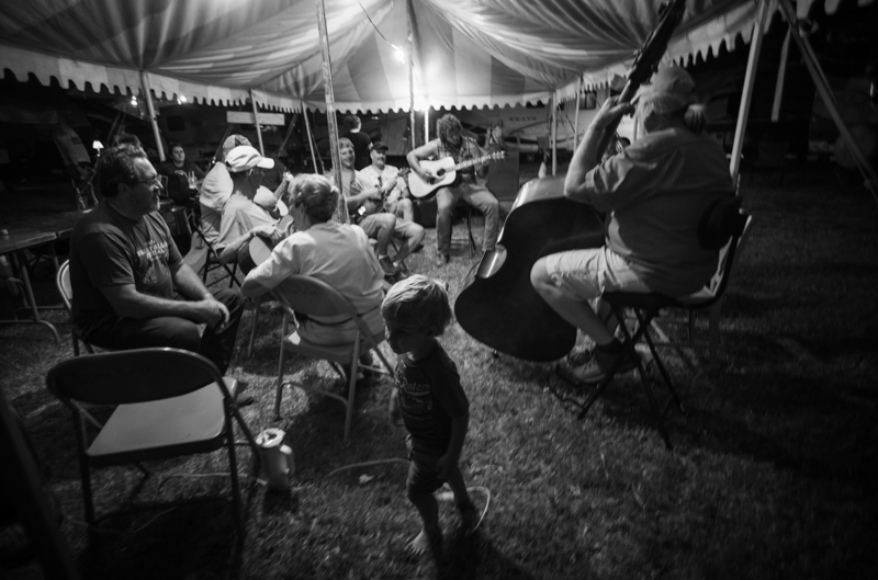 Tent jam, 54th Annual Walnut Valley Festival, Thursday, September 18th, 2026. Winfield, Kansas. Photo by Jeromie Stephens © 2026