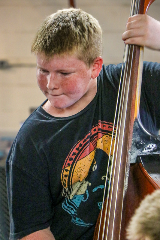 Josiah Green jamming at the 2026 Walnut Valley Festival - photo © G. Nicholas Hancock