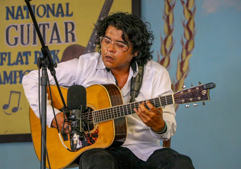Lucas White in the National Flat Pick Guitar competition at the 2026 Walnut Valley Festival - photo © G. Nicholas Hancock