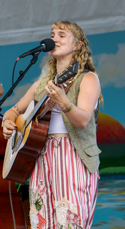 Maddie Cody with The Cody Sisters at the 2026 Walnut Valley Festival - photo © G. Nicholas Hancock