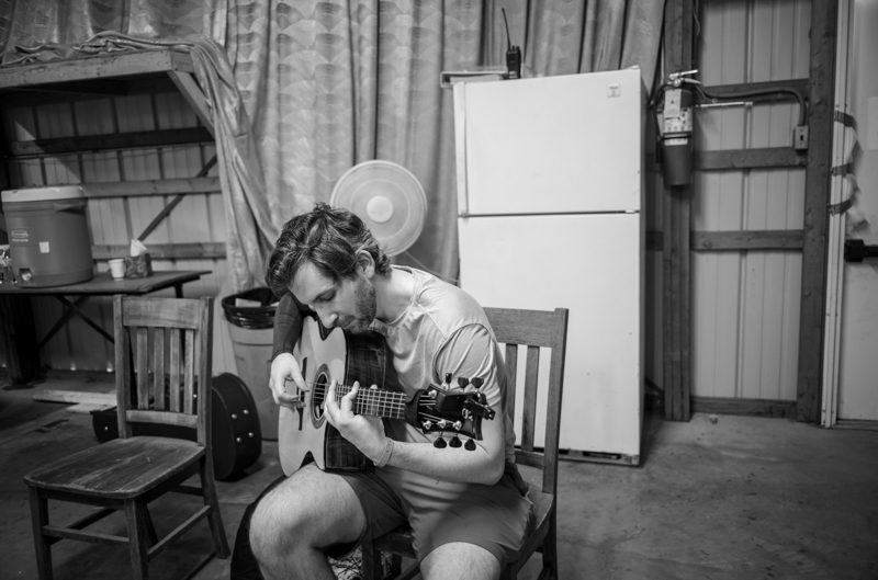 Pregame warmup, Finger Style Guitar competition, 54th Annual Walnut Valley Festival, Wednesday, September 17th, 2026. Winfield, Kansas. Photo by Jeromie Stephens © 2026