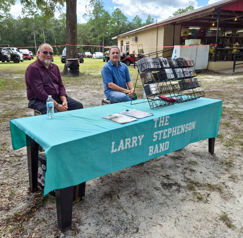Larry Stephenson merch table at the 2026 Twin Oaks Bluegrass Festival