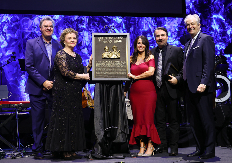 Vince Gill, Jeanie Stanley Allinder, Lisa Stanley Marshall, Ralph Stanley II and Museum CEO, Kyle Young speak onstage during the Country Music Hall of Fame and Museum Class of 2026 Medallion Ceremony at Country Music Hall of Fame and Museum on October 18, 2026 in Nashville, Tennessee. (Photo by Terry Wyatt/Getty Images for Country Music Hall of Fame and Museum)
