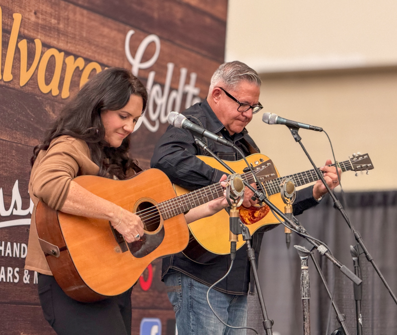 Kenny & Amanda Smith perform in the World of Bluegrass Exhibit Hall - photo © Elizabeth Loring