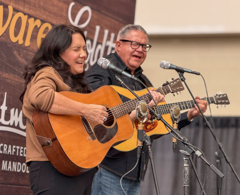 Kenny & Amanda Smith perform in the World of Bluegrass Exhibit Hall - photo © Elizabeth Loring
