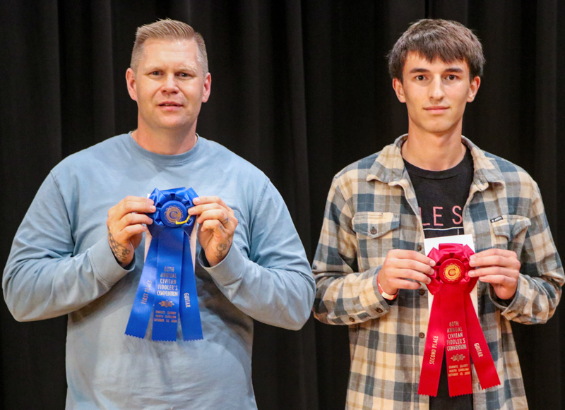 Adam Truell, 1st place; Gabe Webster, 2nd place Adult Guitar at the 2026 Granite Quarry Fiddlers' Convention - photo © G. Nicholas Hancock