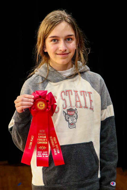 Addie Webster, 2nd place Youth Bluegrass Banjo  at the 2026 Granite Quarry Fiddlers' Convention - photo © G. Nicholas Hancock