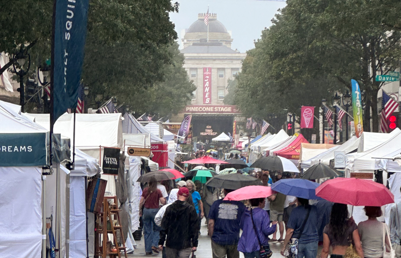 Rain descends on Raleigh Wide Open 2026 - photo © Stacy Chandler