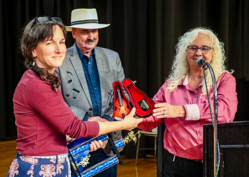 Carrie Webster receiving the Ralph Pennington Memorial  Award at the 2026 Granite Quarry Fiddlers' Convention - photo © G. Nicholas Hancock