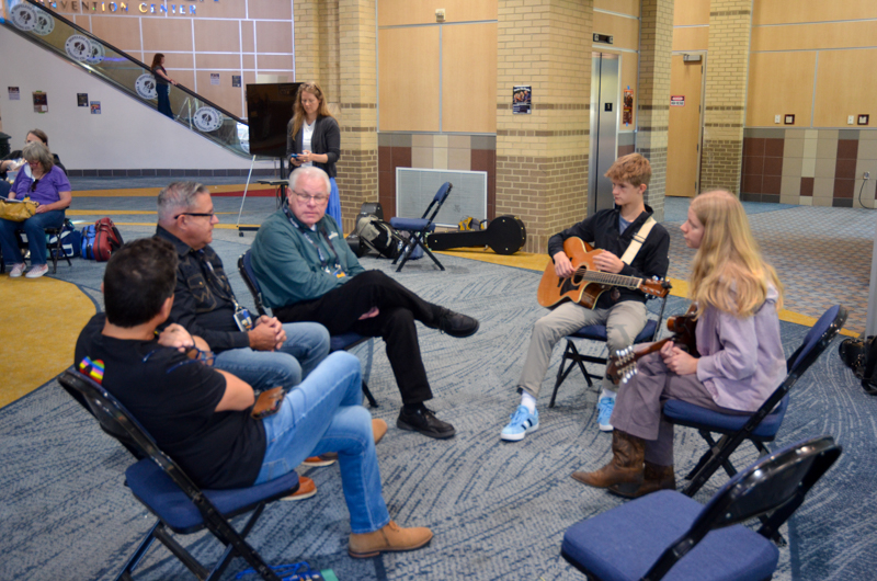 Play For A Pro session with Jamie Johnson, Kenny Smith, and Kyle Cantrell at World of Bluegrass '26 - photo © Roger Black