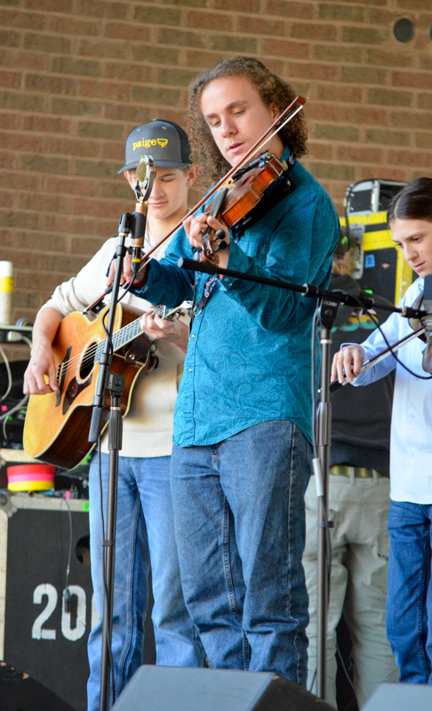 Kids on Bluegrass band performs at Pickin' in the Park '26 - photo © Roger Black