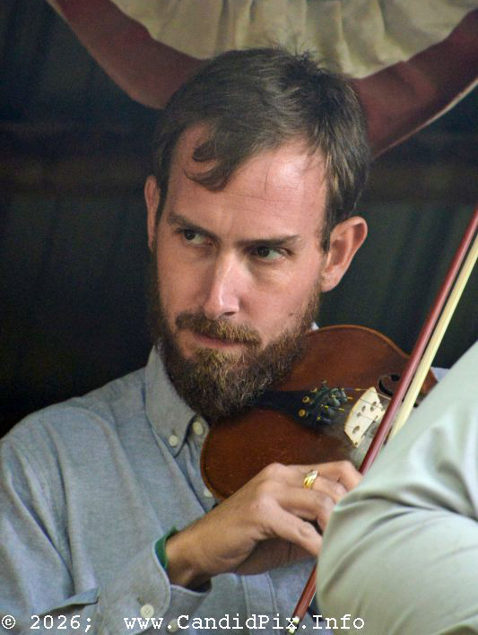 Isaac Smith with Harbourtown at the 2026 Backwoods Bluegrass Fay Fest - photo © Bill Warren
