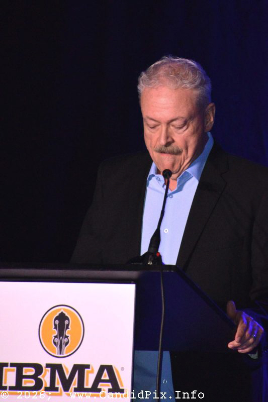 Tim Stafford delivers the keynote address at World of Bluegrass 2026 - photo © Bill Warren