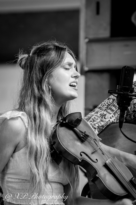 Anneli Burnett with The Burnett Sisters Band at Bluegrass & Brew '26 in Fairborn, OH - photo © Xavier Prenatt