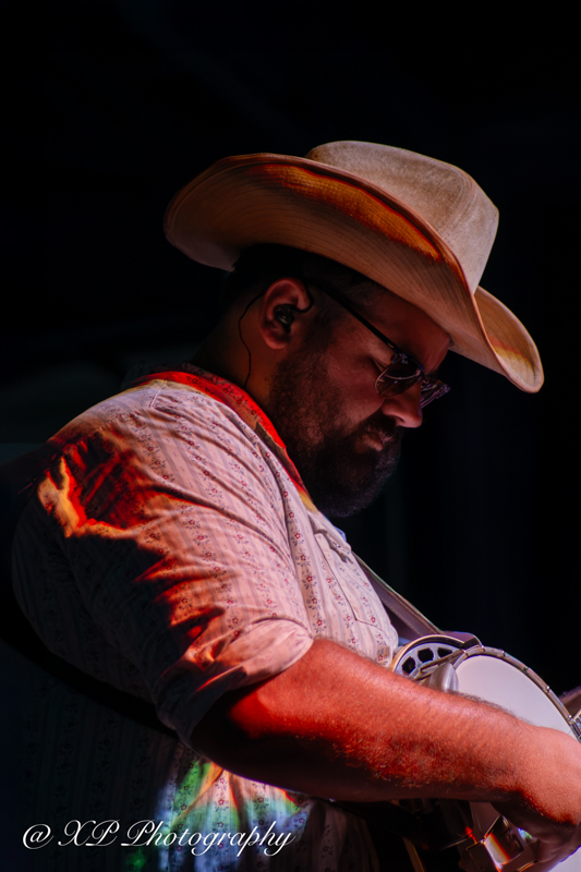 Cody Looper with Jason Carter & Michael Cleveland at Bluegrass & Brew '26 in Fairborn, OH - photo © Xavier Prenatt