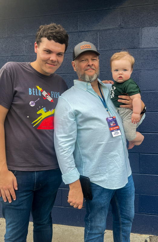 Jason, Jason, and Zebulon Burleson at Blue Highway Fest 2026 - photo © Sandy Hatley