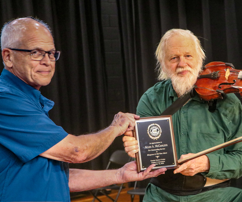 Norman Ribelin presenting award to Allen McCanless at the 2026 Granite Quarry Fiddlers' Convention - photo © G. Nicholas Hancock