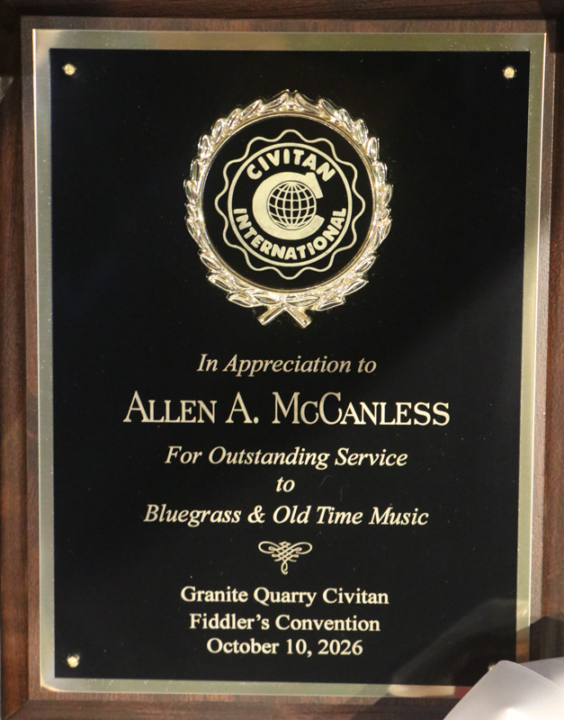 Plaque presented to Fiddlin' Al McCanless at the 2026 Granite Quarry Fiddlers' Convention - photo © G. Nicholas Hancock