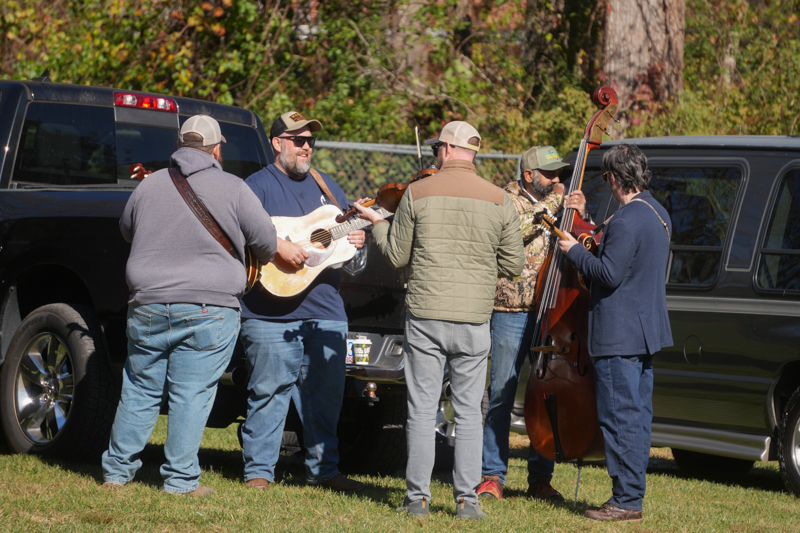 Unspoken Tradition warming up backstage at the 2026 Smoky Mountains Bluegrass Festival - photo © Jeff Lahr