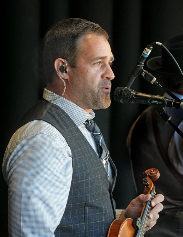 Stephen Hudson with Balsam Range at the 2026 Smoky Mountains Bluegrass Festival - photo © Jeff Lahr