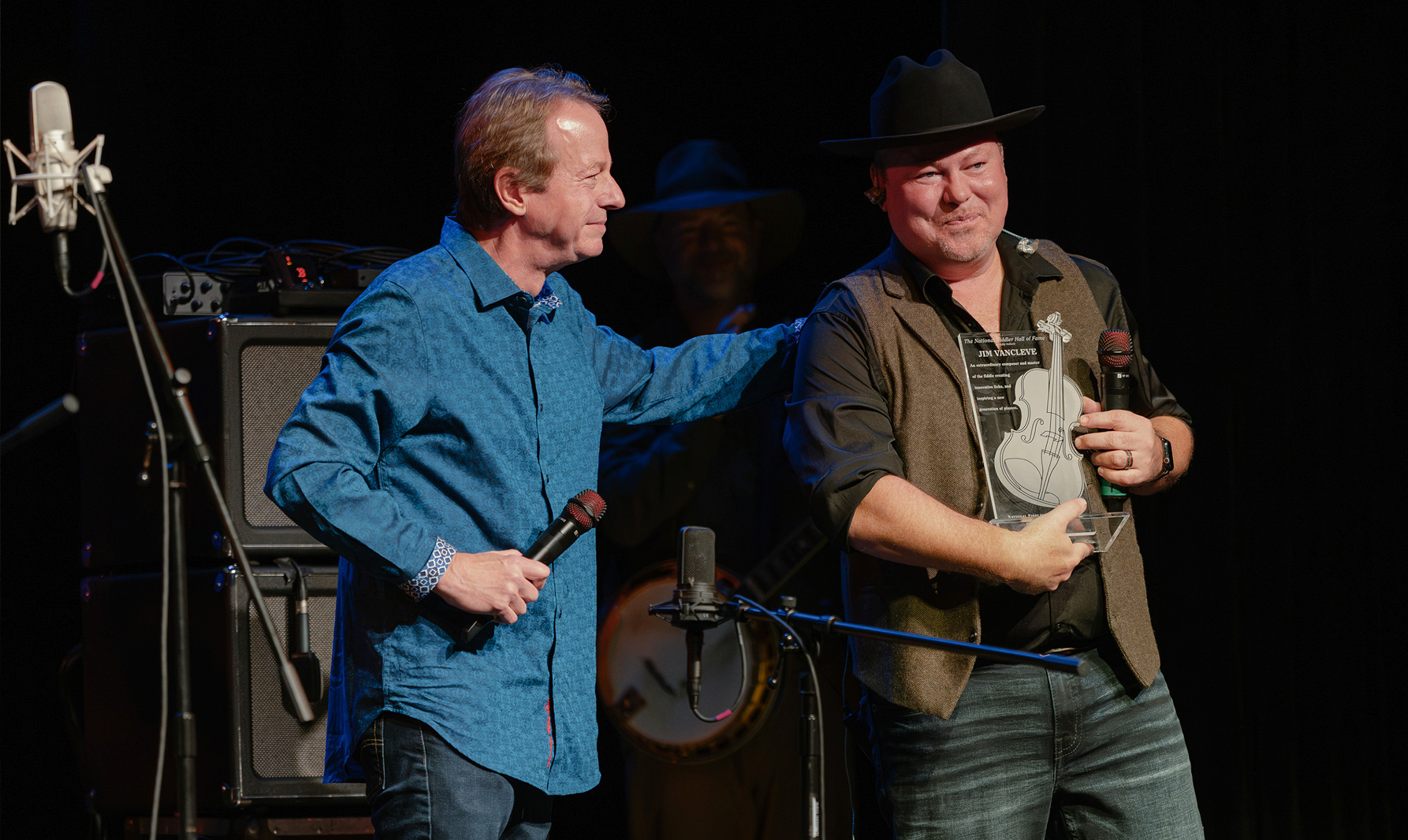Stuart Duncan inducts Jim VanCleve into National Fiddlers Hall of Fame