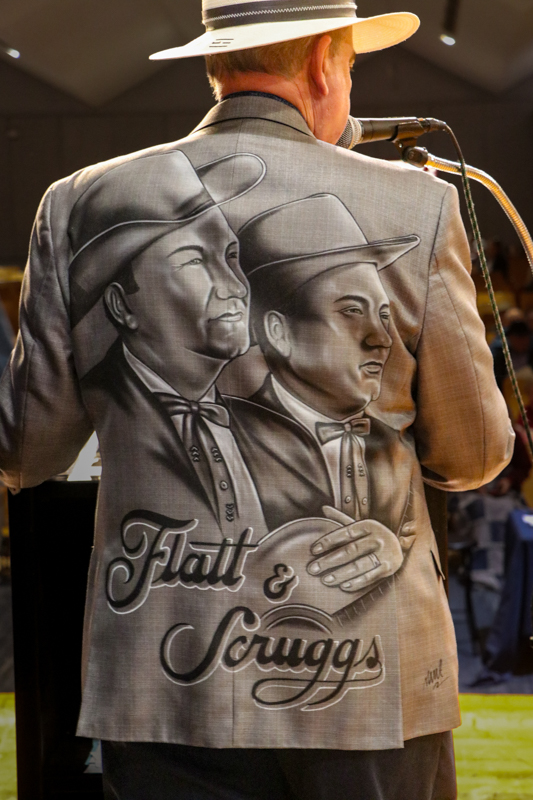 The back of MC Jeff Branch's jacket at the 2026 Granite Quarry Fiddlers' Convention - photo © G. Nicholas Hancock
