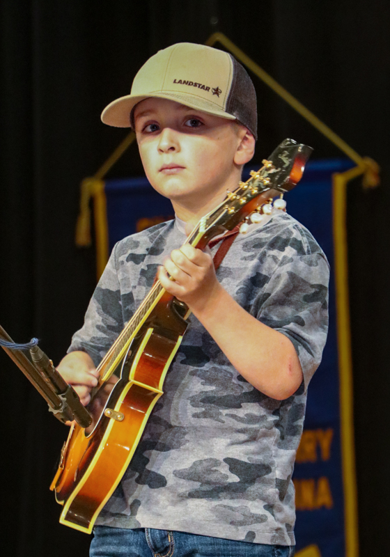 Wyatt Love in Youth Mandolin competition at the 2026 Granite Quarry Fiddlers' Convention - photo © G. Nicholas Hancock